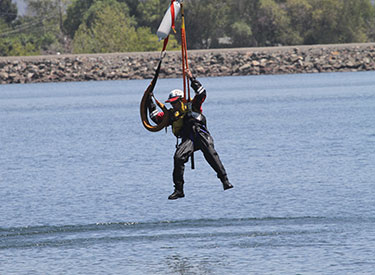 volunteer practicing a water rescue