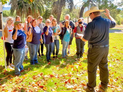 Group of people being sworn in