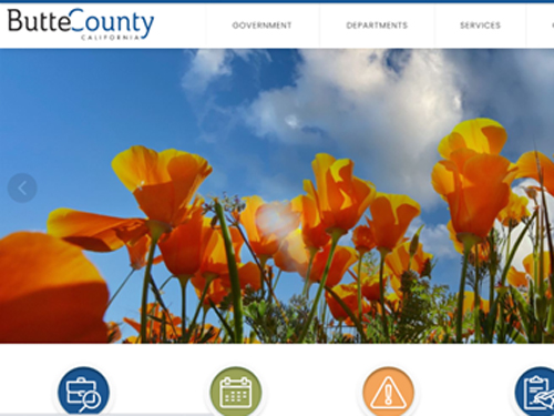 Words Butte County and picture of poppies